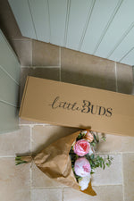 Faux peony, rose and eucalyptus floral arrangement